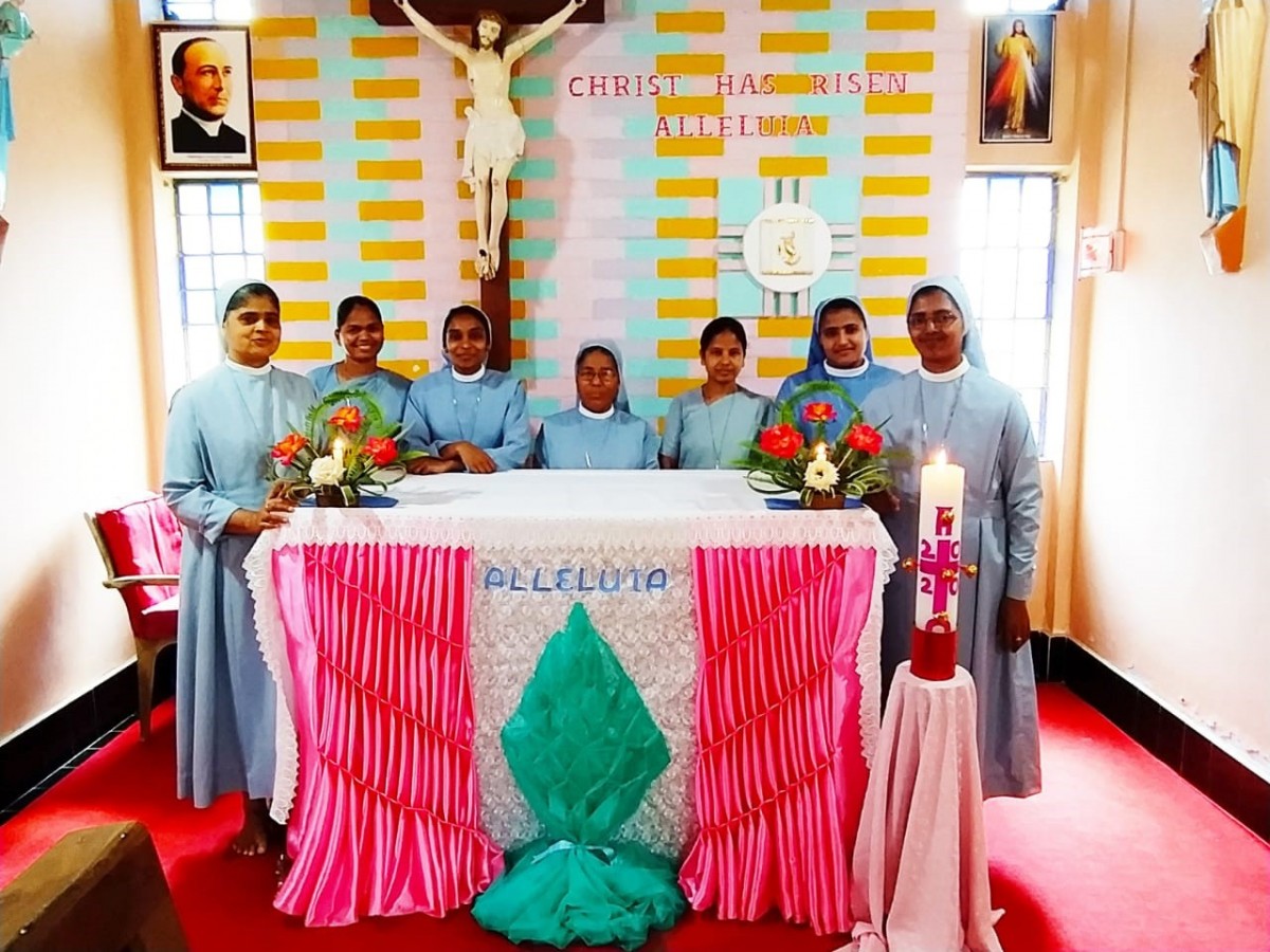 Community gathered around the altar